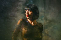 a woman with black hair standing in front of a starry sky